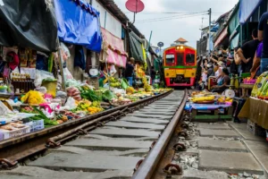 a train going through a food market